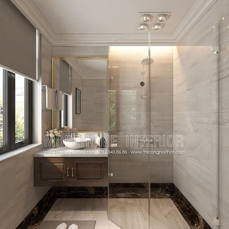 Tủ lavabo gỗ óc chó với gam màu nâu trầm kết hợp ốp đá nhân tạo màu trắng mang lại vẻ đẹp sang trọng và cuốn hút hơn cả đá ốp lavabo